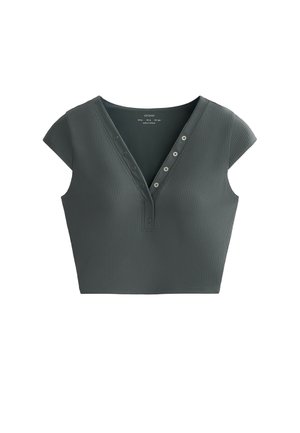 Top corto verde scuro realizzato in tessuto a coste, caratterizzato da un collo a V, maniche corte e sei bottoni decorativi sul davanti.