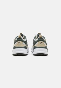 RS-X sneakers featuring a combination of green, beige, and white materials; textured design, padded collar, and rear pull tabs.