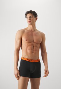 Nike Underwear TRUNK 3 PACK - Boxerbriefs - black/orange/yellow/grey
