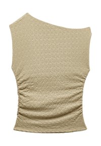 Asymmetrisk, ljusbeige topp med strukturerat zigzag-mönster, rynkdetaljer på sidan och ett mjukt, elastiskt tyg.