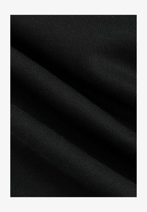 Black fabric with a smooth texture and ribbed pattern, showcasing subtle folds and shadows, emphasizing its lightweight and stretchy qualities.