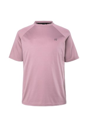 T-shirt rose à manches courtes avec un col rond, des manches raglan, et un petit logo sur la poitrine. Confectionné dans un tissu lisse et léger.