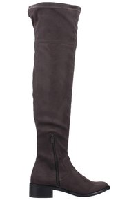 Bottes en daim marron au-dessus du genou avec une semelle plate noire, fermeture éclair latérale et une texture lisse.