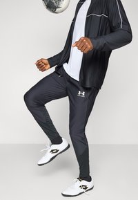 Under Armour PRO PANT - Donji dijelovi trenirke - black/white