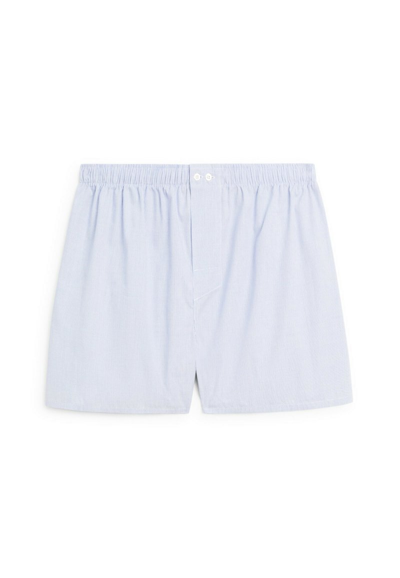 Light blue cotton boxers with an elastic waistband, featuring two front buttons. The fabric has a subtle striped texture.