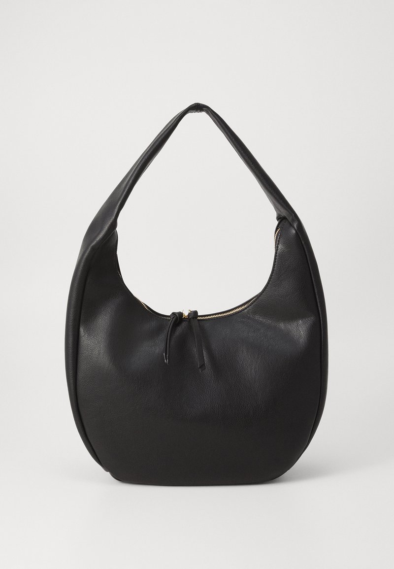 Black leather hobo bag with a soft, curved shape. It features a zip closure at the top and a short, rounded handle. Smooth texture.