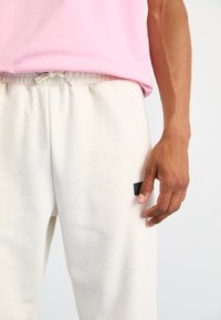 Ellesse MACCHIE - Tréningruha alsók - oatmeal