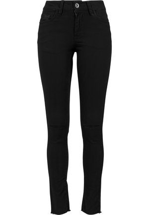 Sorte skinny jeans laget av stretchstoff, med utslitte kneutsnitt, midjehøyde og en frayed kant for et moderne utseende.