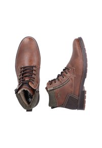 Braune Leder-Stiefeletten mit einem strukturierten grünen Akzent, Schnür- und Reißverschluss, ausgestattet mit einer robusten Gummisohle und gestickten Details.
