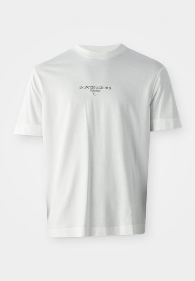 White short-sleeve T-shirt with "EMPORIO ARMANI MILANO" logo centered on the chest in subtle raised lettering.
