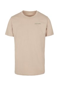 Beige cotton t-shirt with short sleeves and a round neckline. Features the text "DYSTOPIA" in green on the left chest area.