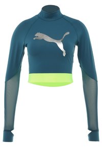Top corto a maniche lunghe teal con collo alto, caratterizzato da un logo Puma argentato in posizione salto e un pannello inferiore di colore verde neon. Maniche in rete per una maggiore traspirabilità.