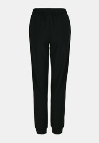 Pantalon de jogging noir avec taille élastique et poignets aux chevilles, vu de dos sur un fond clair uni.