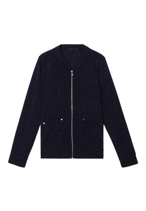 Cardigan bleu marine en fabric texturé, avec une fermeture éclair complète, deux poches avant avec quincaillerie argentée et un col rond.