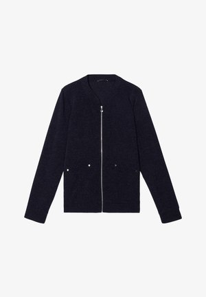 Navy blauwe cardigan van gestructureerde stof, met een volledige rits, twee voorzakken met zilverkleurige hardware en een ronde halslijn.