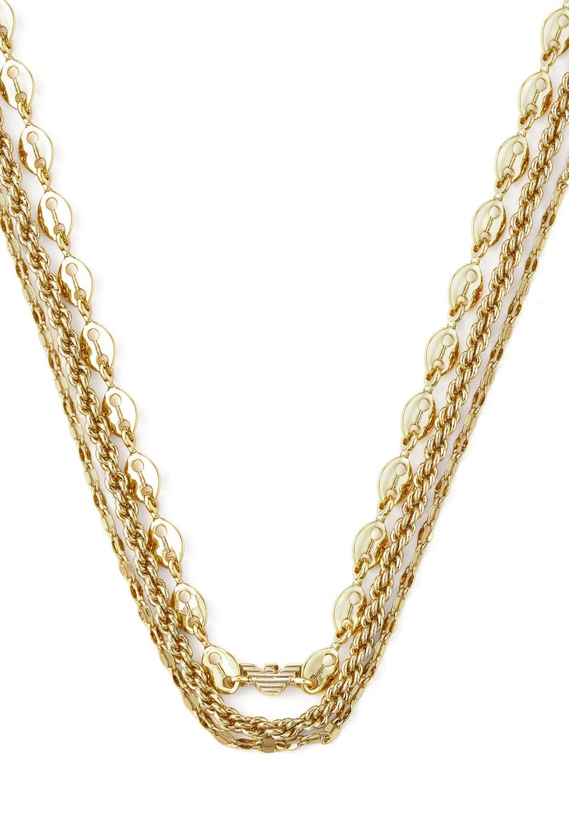 Collana multi-catena in oro con anelli rotondi e attorcigliati, dotata di una chiusura sicura e una superficie liscia. Dettaglio del marchio visibile sulla chiusura.