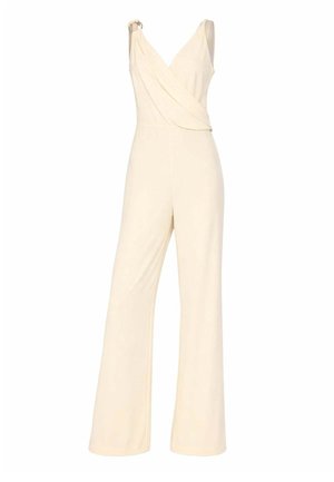 Tuta senza maniche color crema con gambe ampie, scollo a V incrociato e dettaglio con fibbia su una spallina.