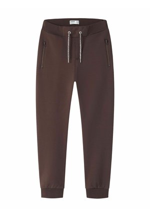 Pantalon de jogging marron foncé avec taille et poignets élastiques, cordon de serrage à la taille, et poches zippées des deux côtés.