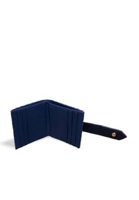 Navy blue wallet opened to show inner card slots and compartments, featuring a strap with a snap button on one side.