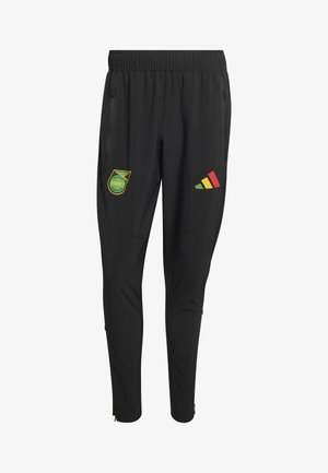 Black athletic pants featuring elastic waistband, zipped side pockets, Jamaica Football Federation crest on left thigh, and tri-color logo on right thigh.