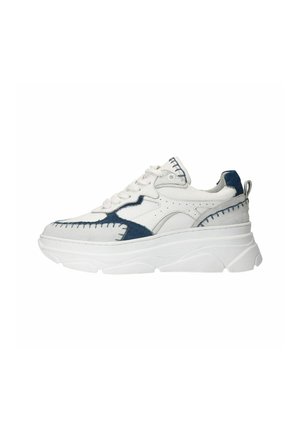 White sneaker with blue suede accents, featuring raised stitching, a thick white sole, and lace-up design. Notable for distinct paneling.