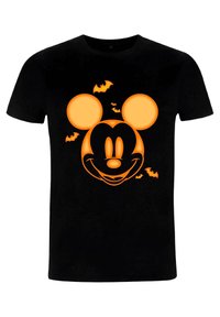 Svart T-shirt med ett orange Mickey Mouse-ansikte och fladdermusdetaljer. Tillverkad av bomull, har den rund hals och korta ärmar.
