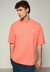 Next SET - Pižamos komplektas - coral orange