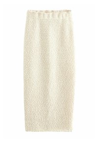 Jupe crayon tricotée en crème avec une surface texturée, taille élastique et silhouette ajustée, conçue pour un look épuré.