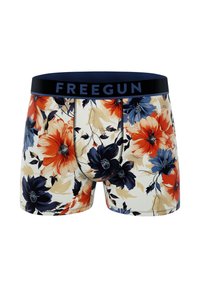 Boxer-briefs floraux avec une ceinture élastique navy portant le nom de la marque "FREEGUN". Le motif comprend de grandes fleurs rouges, bleues et beiges.