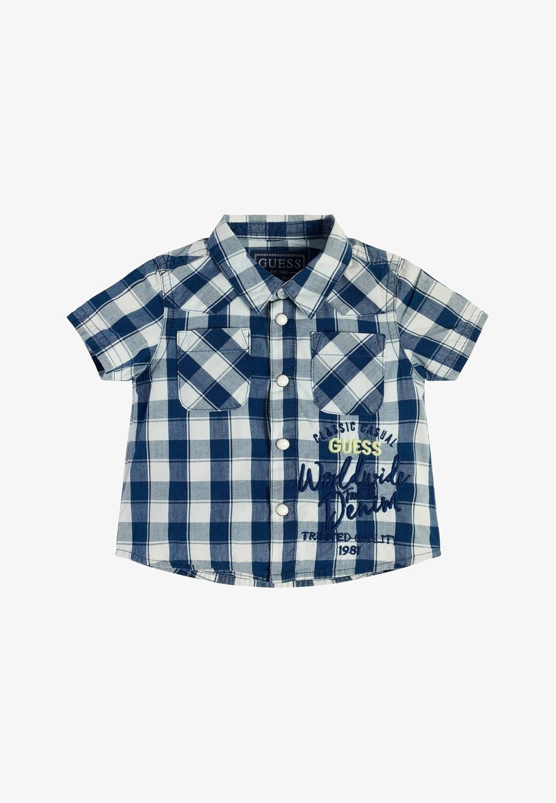 Camicetta a maniche corte con pattern a scacchi blu e bianchi, due tasche anteriori e testo ricamato in basso a sinistra. Materiale in cotone.