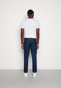 Tommy Jeans SCANTON SLIM - Vaqueros slim fit - denim dark