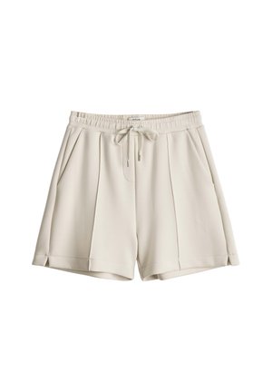 Pantaloncini beige chiaro con vita elastica, coulisse frontale, tasche laterali e dettagli plissettati, realizzati in tessuto liscio.