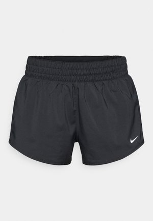 Shorts de sport noirs avec une taille élastique et une coupe ample. Dotés d'un logo Nike blanc distinctif sur le bas à l'avant.