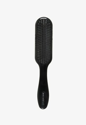 Black hairbrush with a long, flat paddle design, textured bristles, and a streamlined grip handle. Glossy finish on the surface.