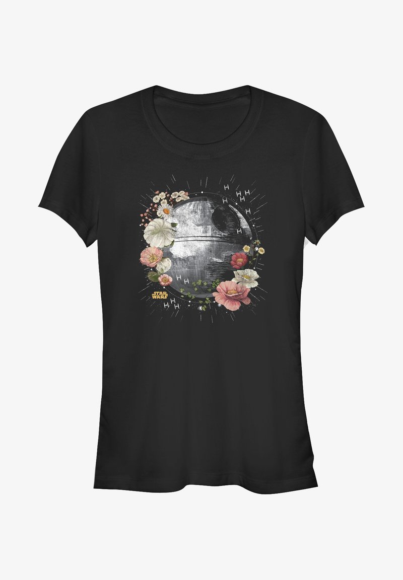 T-shirt noir avec un imprimé graphique de l'Étoile de la Mort entourée de fleurs colorées. Matière en coton avec un design à col rond.