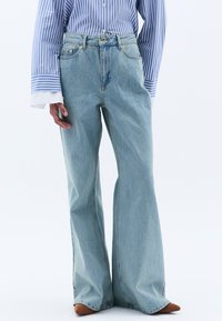 Široké džíny - light green denim