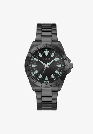 Fekete, rozsdamentes acél Guess karóra világító óramutatókkal, három mutatóval és tachiméteres lünettával, összekapcsolt szíjon.