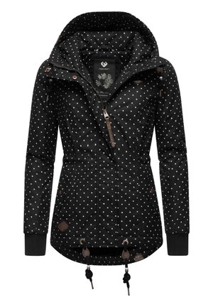 Veste noire avec des pois blancs, devant zippé, capuche ajustable avec cordons, et accents marron sur les zips et les poignets.