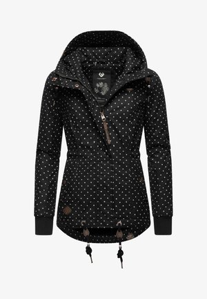 Black jacket featuring white polka dots, a zippered front, adjustable hood with drawstrings, and brown accents on zippers and cuffs.
