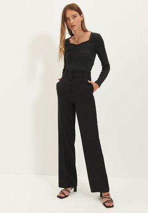 Pantalones - black