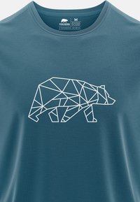 Teal cotton t-shirt featuring a white geometric bear graphic. The crewneck design has a smooth texture and short sleeves.