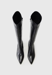 Knee-high black leather boots with a pointed toe and smooth texture. Features a zipper on the side for easy wear.