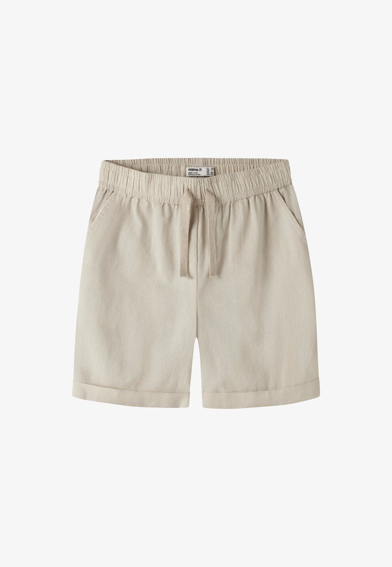 Shorts beige en coton avec taille élastique, cordon en tissu, poches latérales et ourlets retournés.