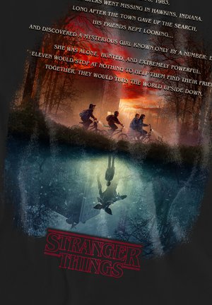 Black t-shirt featuring a dual design: upper scene with four boys on bicycles against a red sunset; lower scene with a figure in a dark, eerie forest, blue tones.