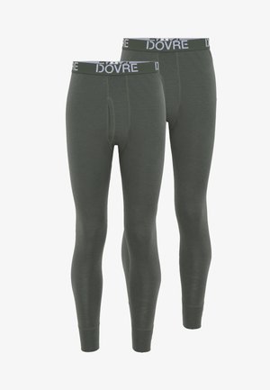 Grønne termolegninger med en elastisk talje, der har "IDOVRE" branding. Stoffet har en glat overflade og en tætsiddende pasform.