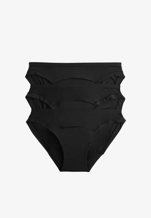 Trzy złożone czarne bawełniane damskie majtki bikini ułożone na białym tle.