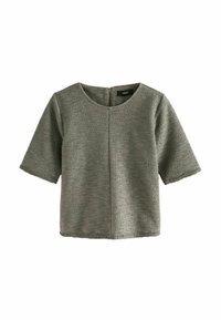 Krótki rękaw w fakturowanej oliwkowej tkaninie, z okrągłym dekoltem i zamkiem z tyłu, o prostym kroju i minimalnych szwach.
