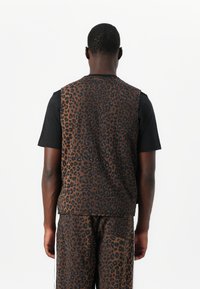 adidas Originals GRAPHIC UNISEX - Vesta - bronze strata