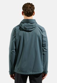 Weatherproof jacket in slate blue, with a hood, adjustable cuffs, and a smooth, lightweight texture. Seamless back design for comfort.