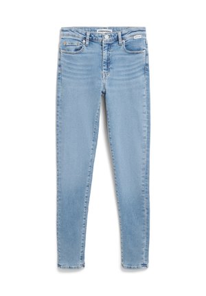 Light blue skinny jeans made from denim, featuring a classic five-pocket design and a zip fly with a button closure, smooth texture.